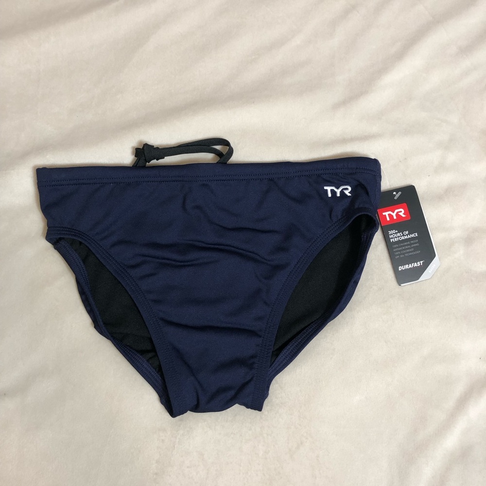 Blue TYR polyester swim brief. Size 32 and double lined.